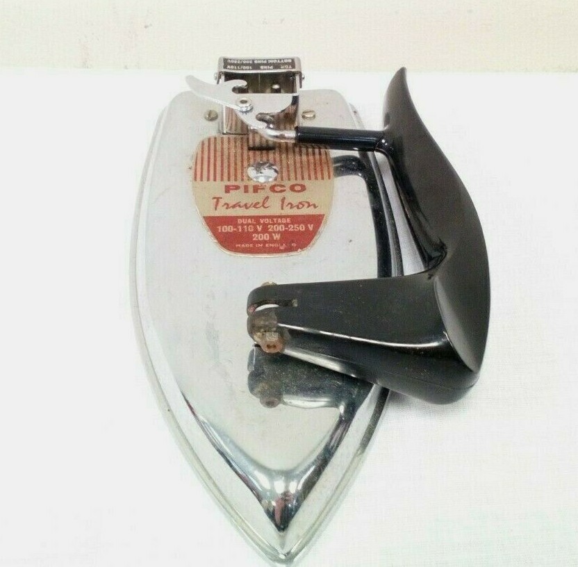 Fer de voyage pliant Norelco TI-70 avec vaporisateur