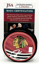 Kevin Korchinski signed Chicago Blackhawks Reverse Retro Puck autographed #2 JSA