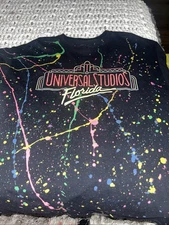 Universal Studios HOLLYWOOD Retro AOP Paint Splatter Adult Shirt Black 