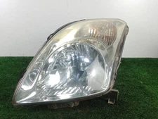 3530062J11 FRONT LEFT HEADLIGHT / BOTTOM. CHROME / 744863 FOR SUZUKI SWIFT III