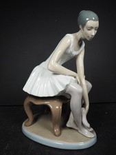 NAO by Lladro Figurine Elegant Ballet Ballerina Seated Putting On Shoes No. 387