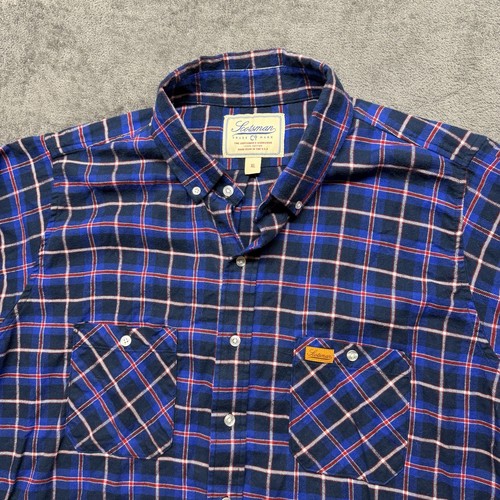 Scotsman men’s XL blue plaid flannel shirt with red and white stripes, two front pockets, and button-up collar.