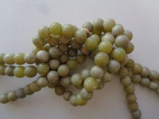 Bead, olive new "jade" serpentine  natural , dark, 8mm round, 15in strand