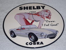 VINTAGE 1966 FORD SHELBY COBRA SPORTS CAR & WOMAN 12" METAL GASOLINE & OIL SIGN!