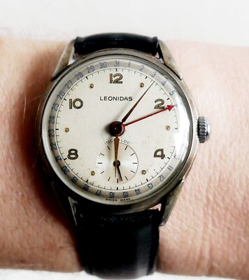 Leonidas suit watch with date hand rare