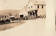 1920s RPPC Postcard Flag Parade School General Store Child AZO Real Photo  *Ab6a