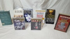 Audio books Lot Of 8 18 tapes . One unopened and the others in good condition.