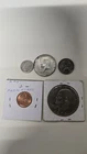 Lot of 1 90% Silver dime, 1 1968 half, 1 1943 nickle, 1 1974 dollar,1 2009 penny