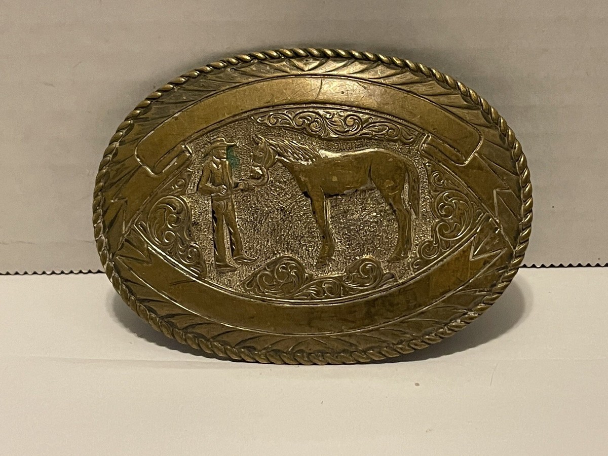 Crumrine El Arturo Bronze Cowboy Holding A Horse Belt Buckle 