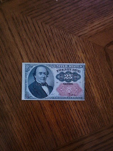 1874 25 cent fractional currency. Small Pin hole In Upper Right Corner.