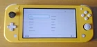 Nintendo Switch Lite Yellow Handheld Game Console working condition inc charger