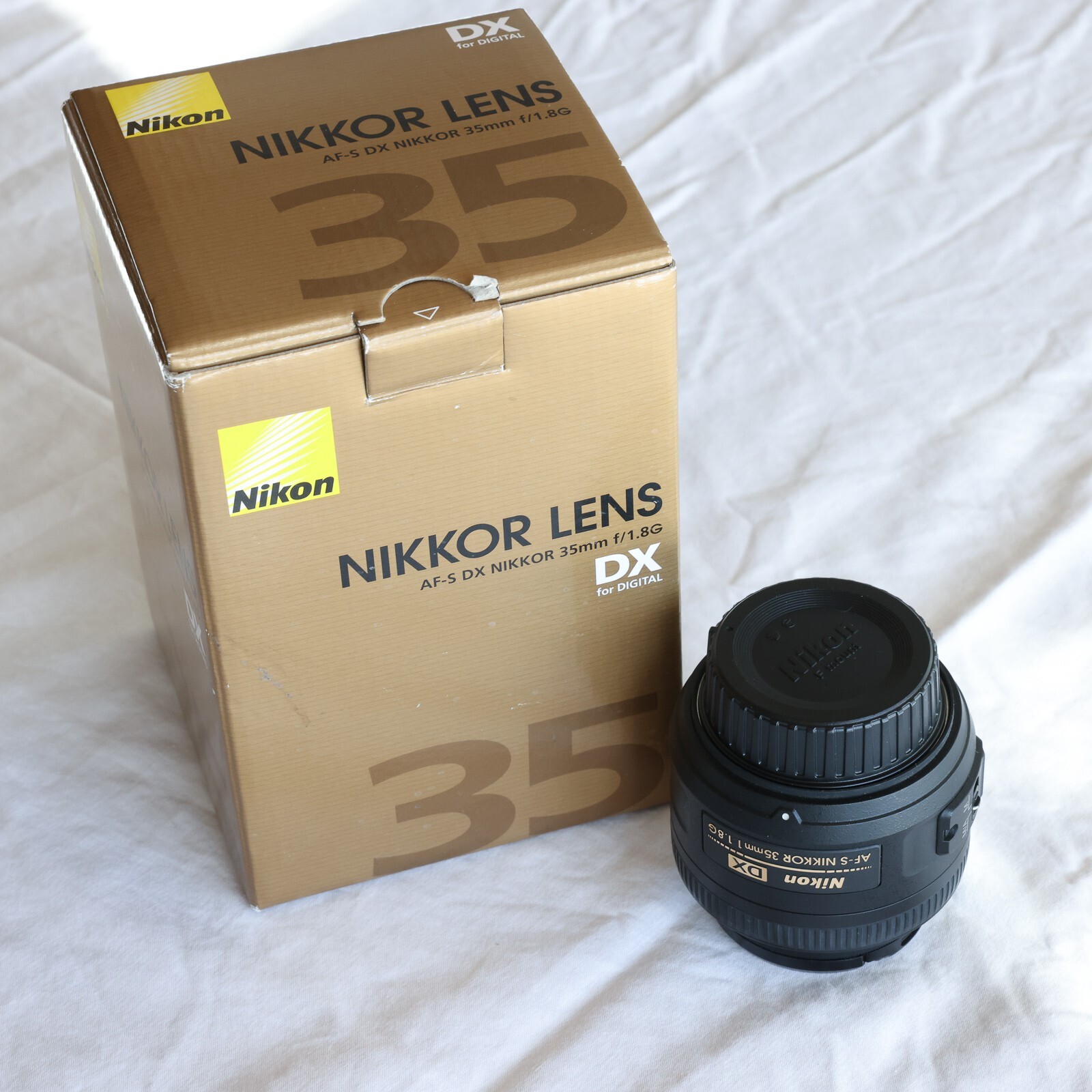 Nikkor 35 mm F/1.8G AFS DX Lens with UV filter for Nikon cameras