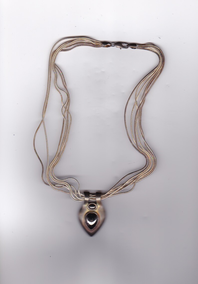 Multiple Stranded Silver colored Necklace with Un… - image 1