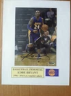 Signed Kobe Bryant 5x7 color photo matted to 8x10 w/coa