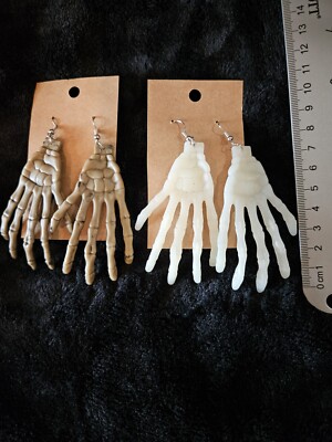 Halloween SKELETON HANDS EARRINGS. 2 styles. Choose one. One GLOWS IN THE DARK!!