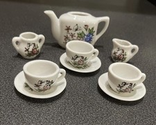 Vintage 9 Piece miniature porcelain tea set Made In Japan. No Packaging