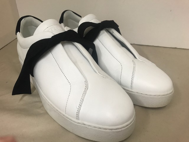 white leather slip on sneakers womens