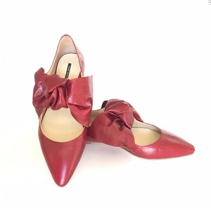 red pointed flat shoes