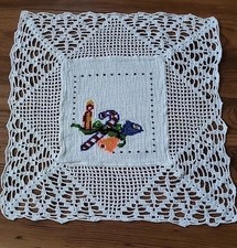 Vintage handmade crocheted doily with Cross stitched Christmas ornament 12" 12"