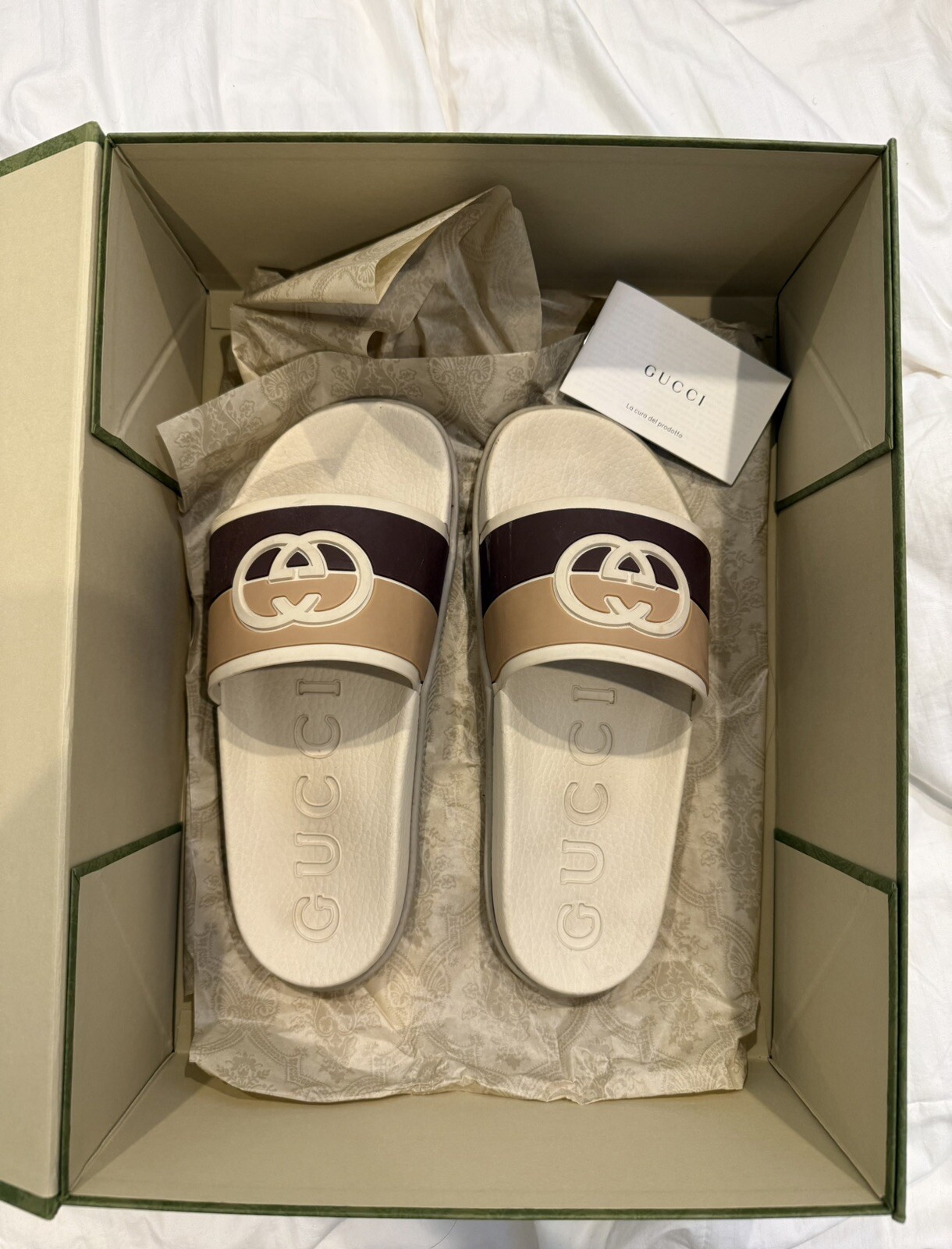 Gucci logo-embossed leather slides for men and women-image