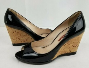 black patent leather wedges