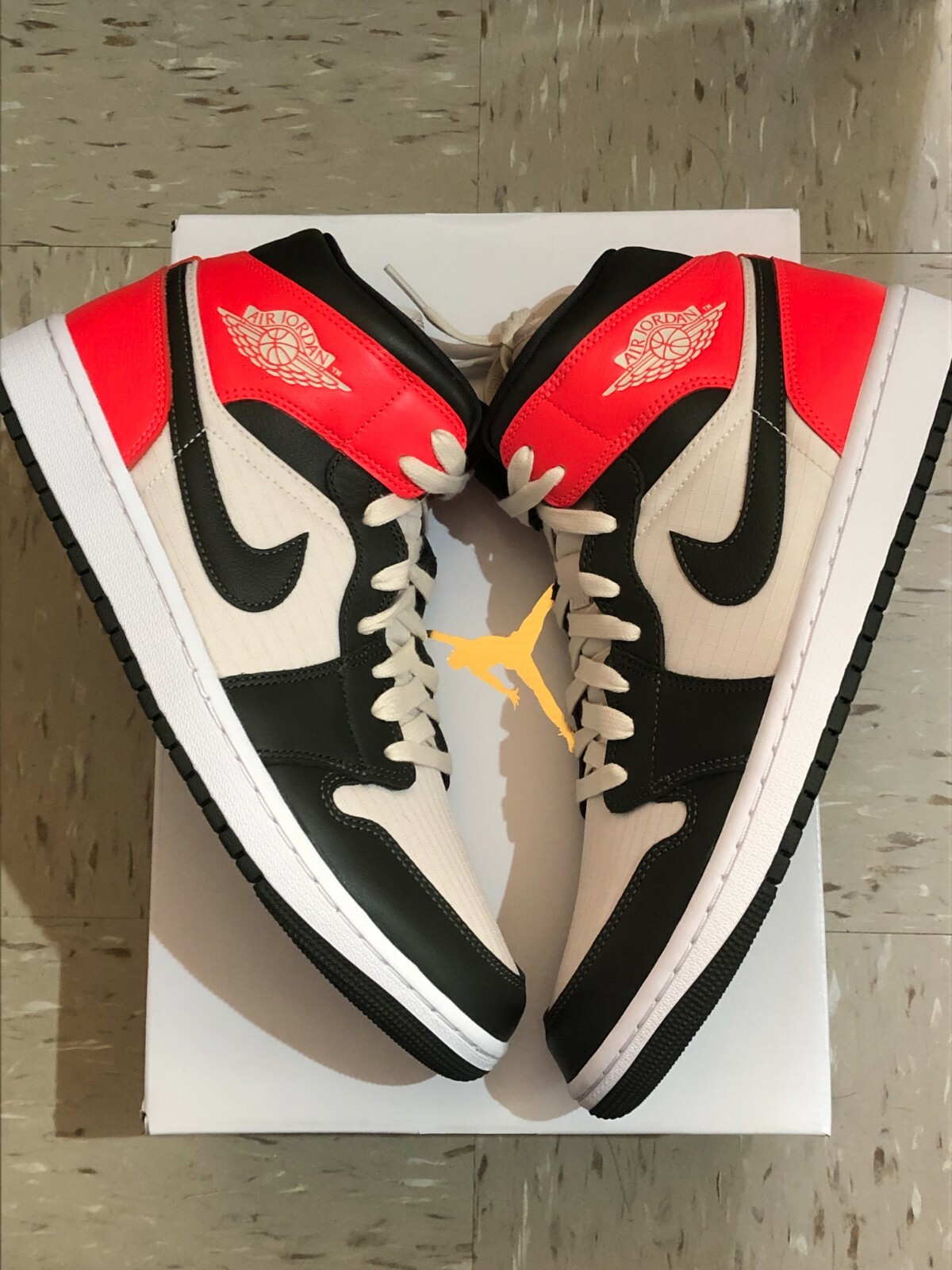 bright crimson black jordan 1