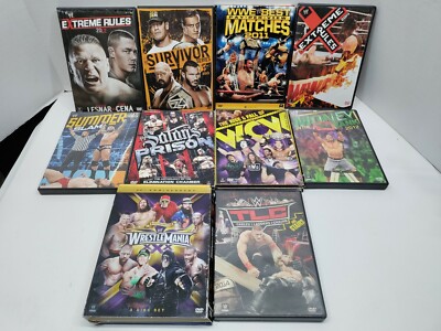 WWE 特集DVD 10本セット Rock,mysterio etc.. WWE Wrestling DVD Lot of 10 (18 Total Discs) Discs Very Good Shape