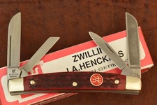 JA HENCKELS  SOLINGEN GERMANY RED BONE PREMIUM CONGRESS KNIFE NICE (27817)