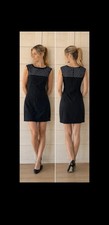 Black dress with a geometric cutout pattern