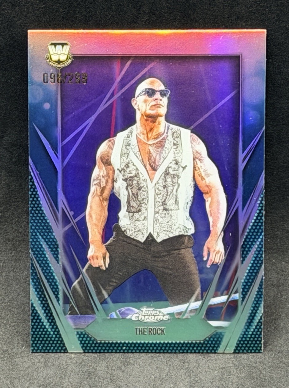 The Rock 2026 Topps Chrome WWE True Aqua /299 Refractor #1