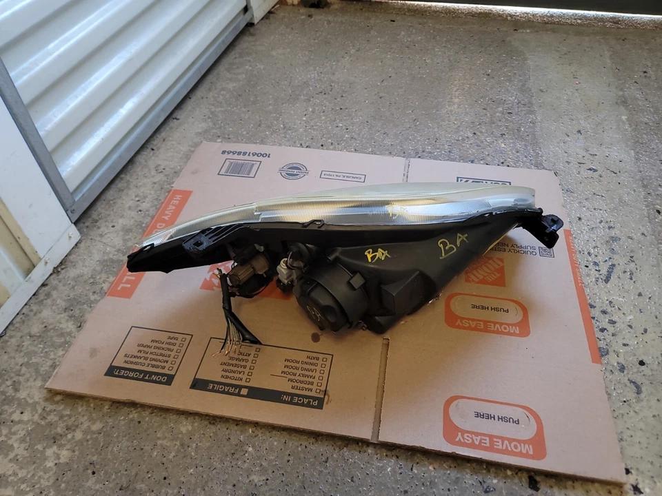 Conjunto de faros de xenón HID lado izquierdo/del conductor Mitsubishi Eclipse 2009-2012 OEM Foto 3 de 4