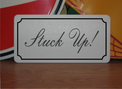 Stuck Up! Metal Sign in Fancy Script and Black Border
