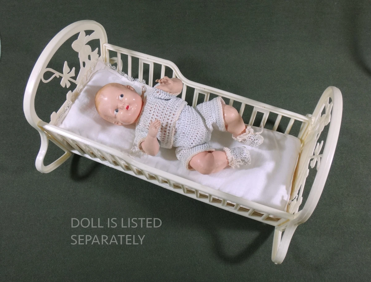 Plastic baby doll outlet bed