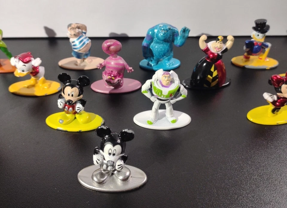 Jada Toys 16 Die Cast Mini Figuras de Metal Disney Mickey Buzz Mini Sully Peter Pan Foto 3 de 4