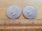 (2) PAIR -1995 KENNEDY HALF DOLLAR ERROR COINS, CRACK ON NECKS PLUS 5 IS AN "S"