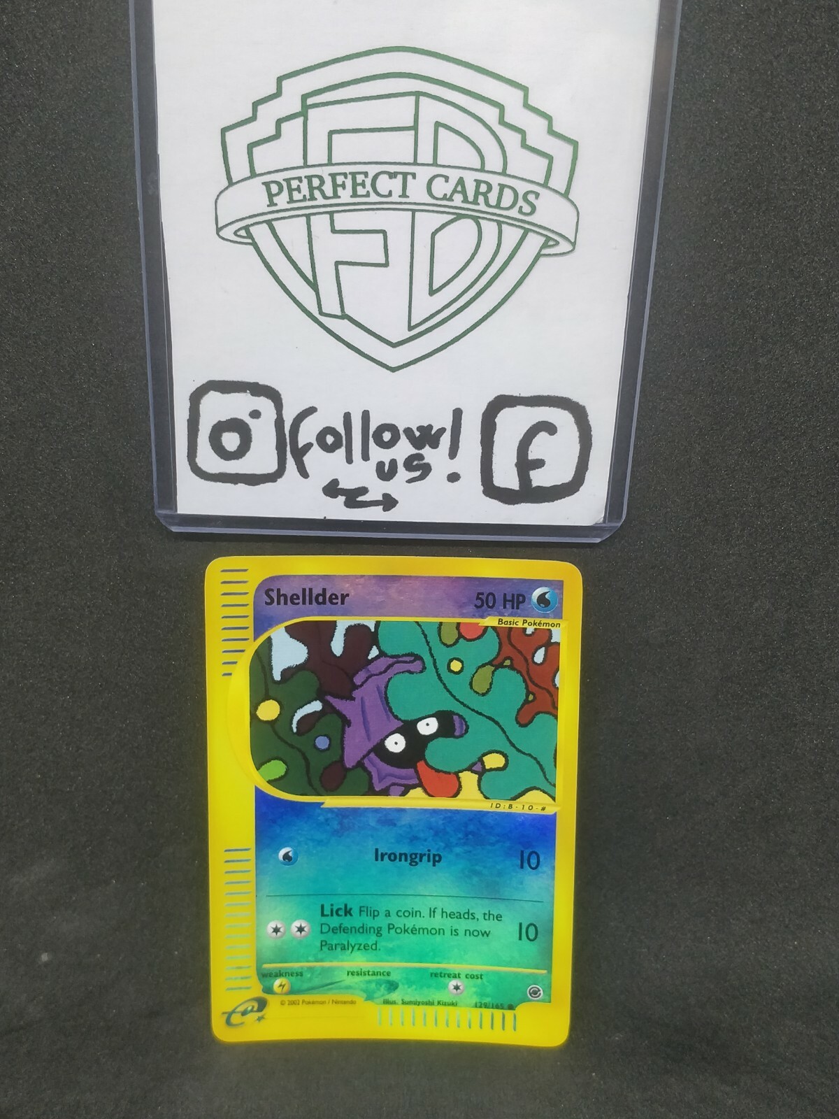 POKÉMON EXPEDITION SHELLDER REVERSE 129/165 NM ENG