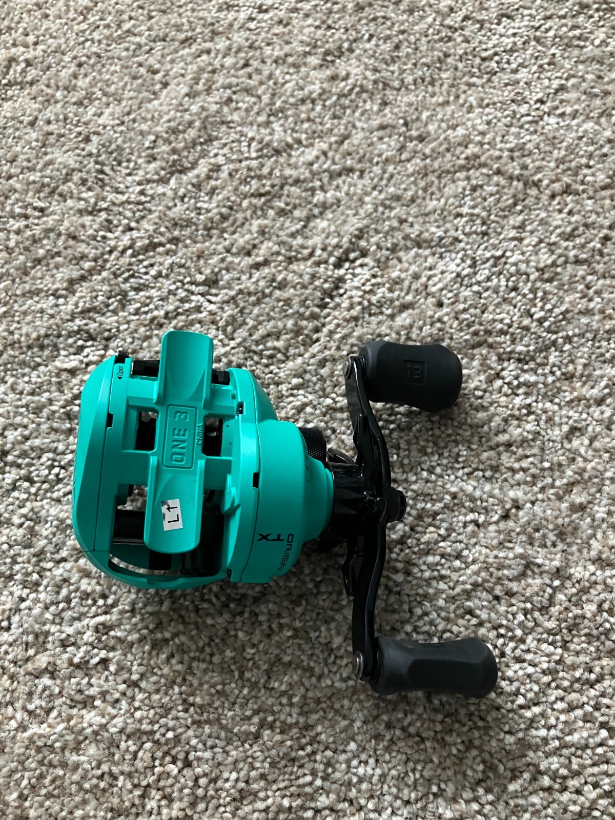 One 3 Fishing Origin TX Right Hand 7.3:1 Bait Casting Reel