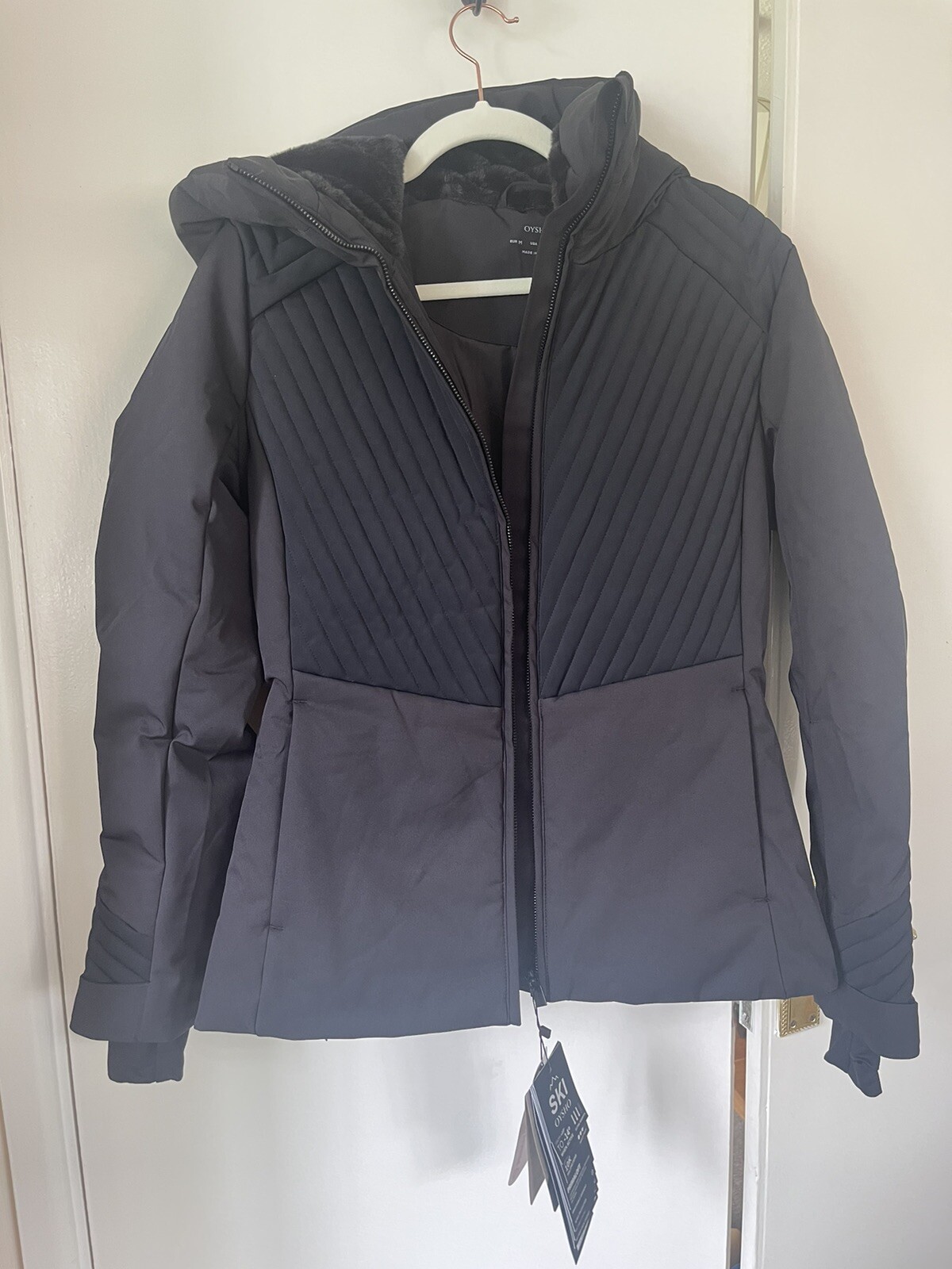 Chaqueta acolchada con cinturón Oysho negra talla mediana etiquetas nuevas