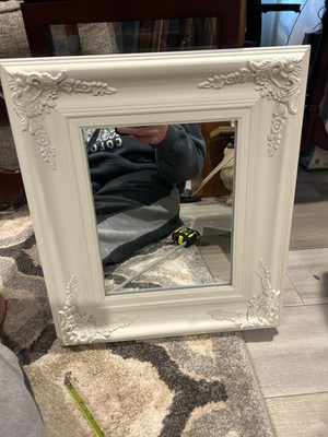 French ornate embossed wood wall mirror in a shabby white finish. 