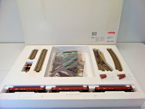 Locomotora Märklin Modeltrain 82774, escala H0, con 3 vagones de mercancías. | Condition: Usado