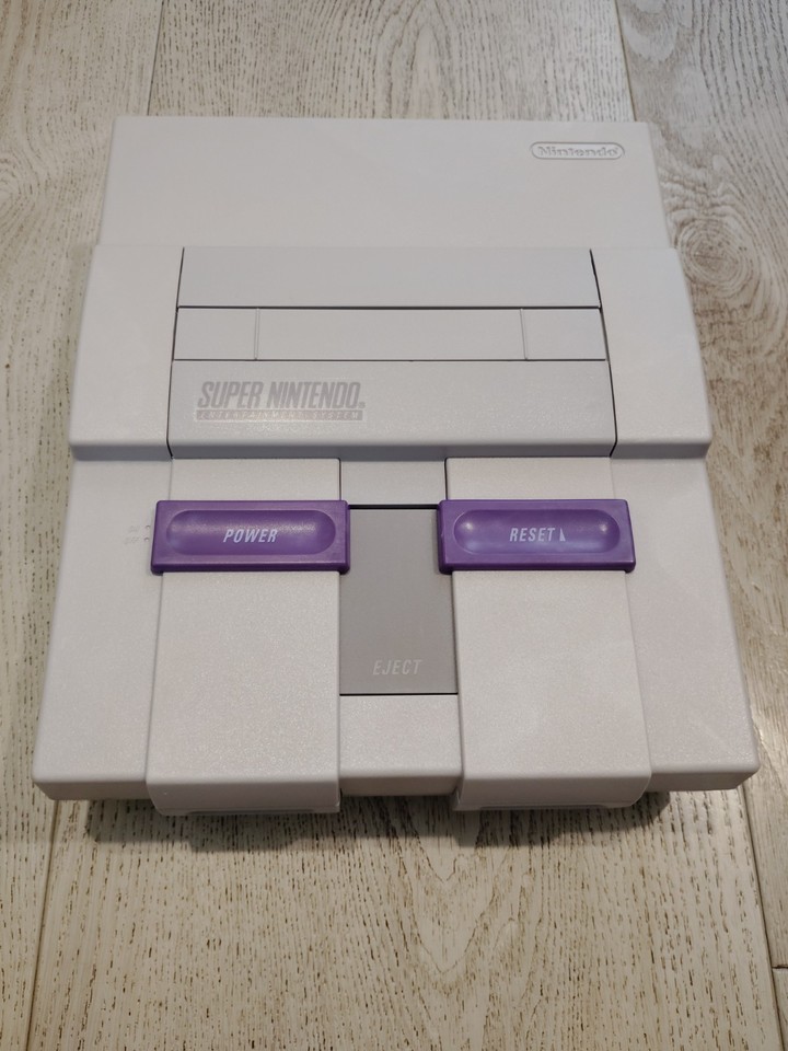 Tested, working SNES — the most beloved Nintendo console of all time, still endlessly playable and instantly recognizable to anyone who grew up in the 90s.