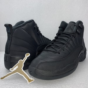 triple black jordans 12