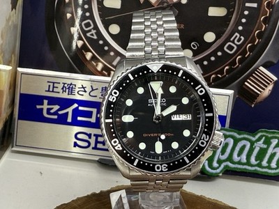 Seiko Men's Black Watch   SKX007 Classic Automatic Survivor Diver Neues Armband