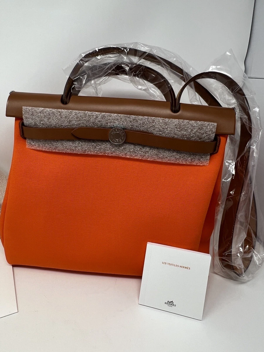 Hermès VINTAGE HERMES TRAVEL HANDBAG IN CANVAS & BEIGE LEATHER