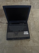 Toshiba Satellite from the 2000s, does NOT turn on, comes with charger