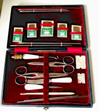 ANTIQUE  CASED SEW KIT,LOTS OF TOOLS & THIMBLE &  6 NEEDLE PACKS.