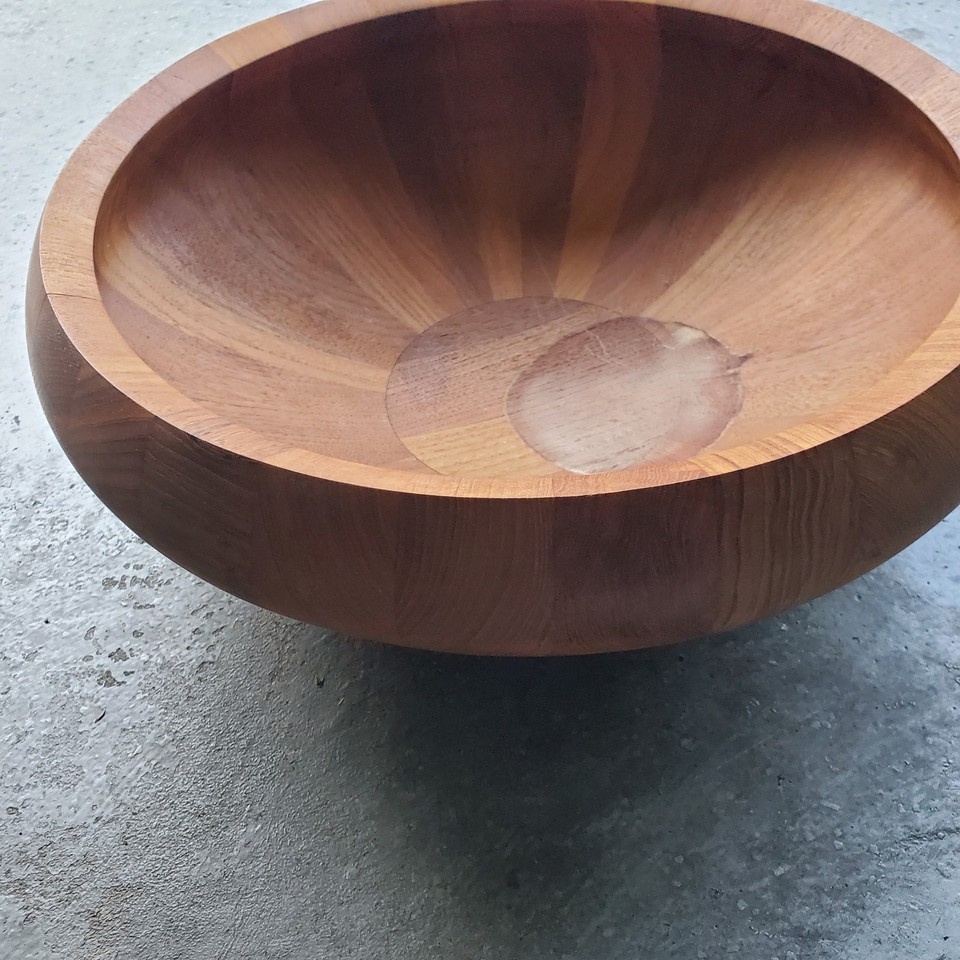 This is a mid-century modern staved teak bowl designed by Jens
