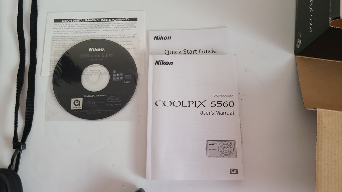 Nikon S560 Coolpix 10.0MP Digital Camera 16 GB Card, Soft Case And