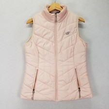 Chaleco acolchado New Balance rosa mediano acolchado para mujer bolsillos atléticos para correr M