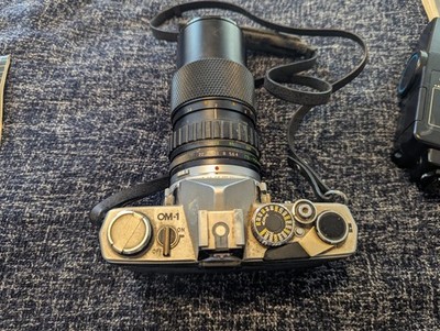 Olympus OM-1 35mm SLR Film Camera w/ two lenses Zuiko